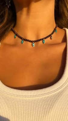 שרשרת פנינים חומות עם עיניים אמייל בצורת מרקיזות