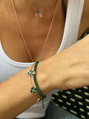 שרשרת מליז Meliz's flower - פרח משובץ אמרלדים וספירים ורודים