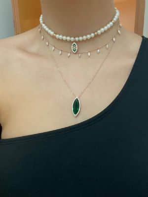 שרשרת פנינים עם זהב ועין אמייל משובצת